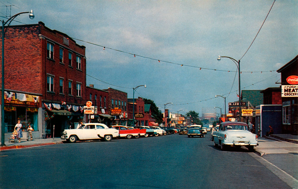 Two identical 1957 Plymouth Savoy on Jarvis Street in Fort Erie, Ontario